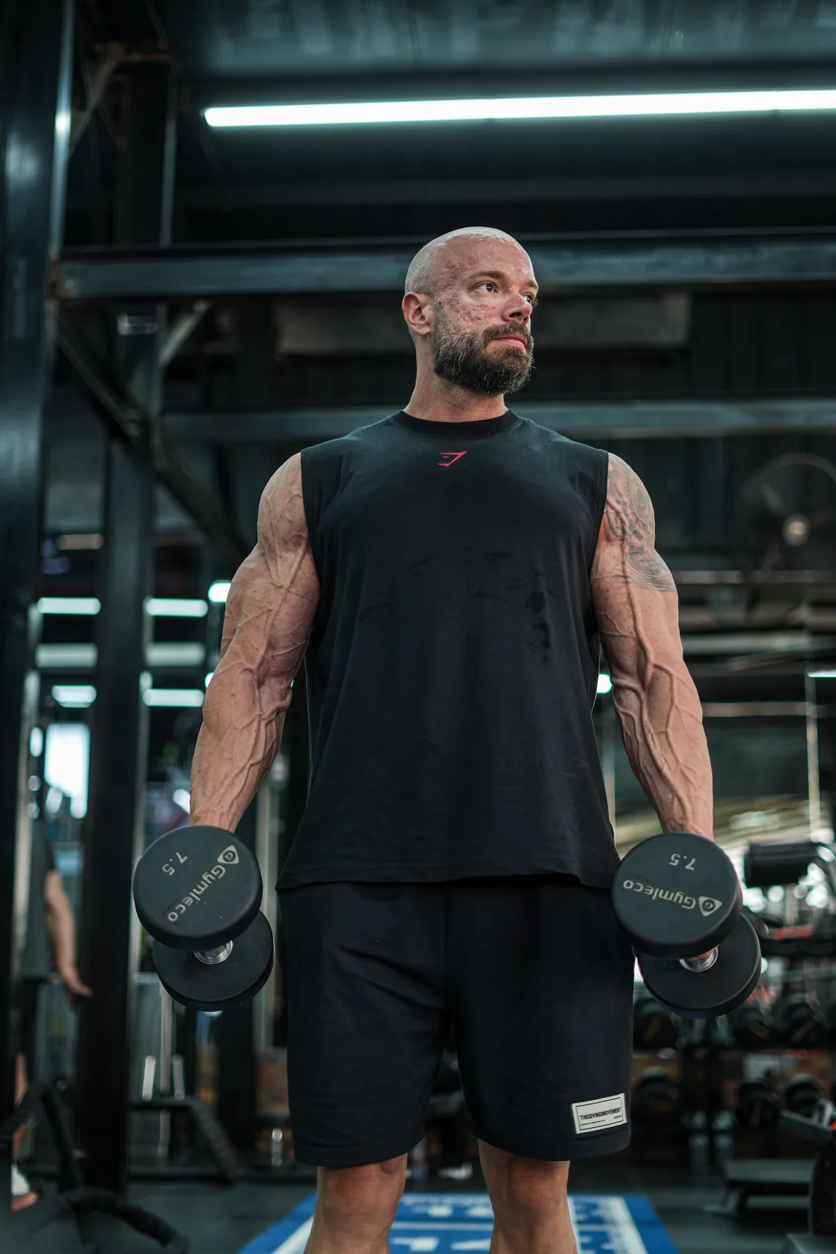 Coach Mirza training with dumbbells